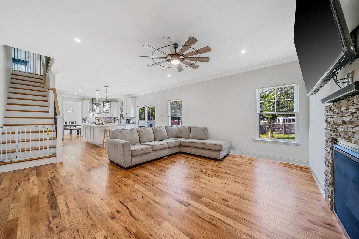 Fireplace, Interior, Kitchen, Living room, Pendant Lights, Recessed Lighting, Stone Walls, Wood Texture Flooring