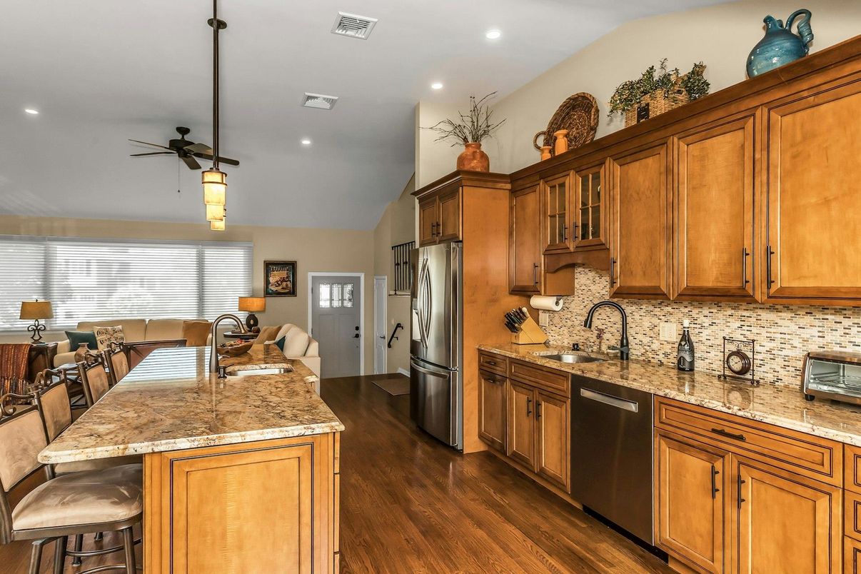 Dining room, Interior, Kitchen, Pendant Lights, Recessed Lighting, Stainless Steel Appliances, Wood Texture Flooring