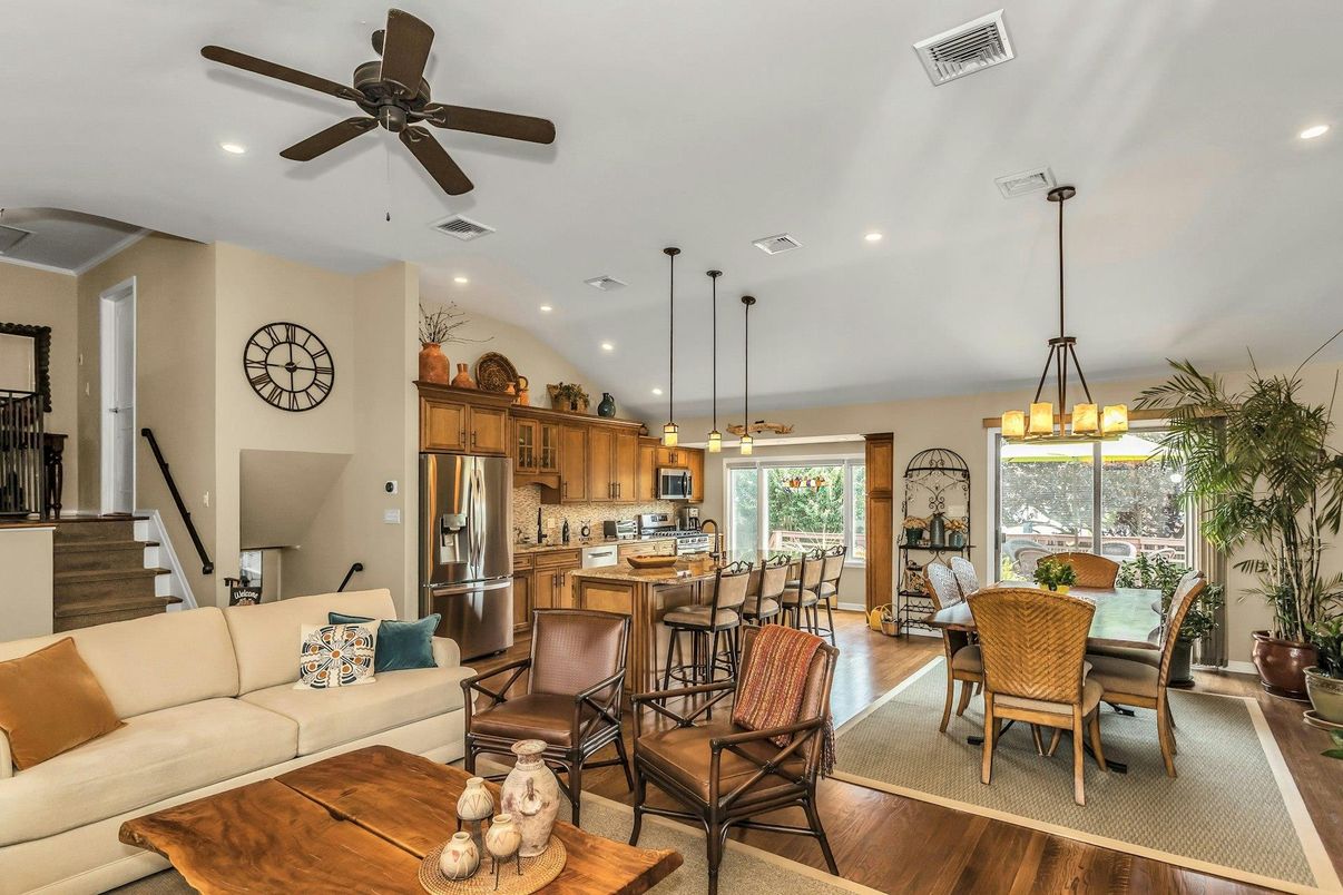 Chandelier, Dining room, Interior, Kitchen, Living room, Pendant Lights, Recessed Lighting, Stainless Steel Appliances, Wood Texture Flooring