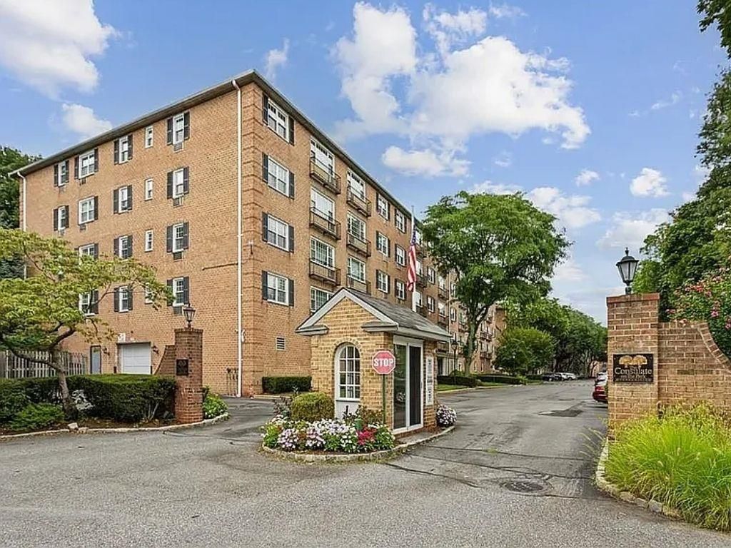 Exterior, Facade, Brick Facade, Condo Building