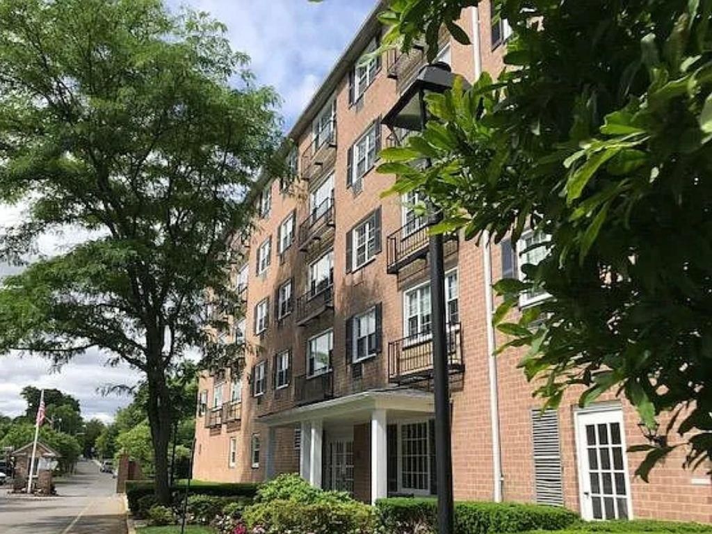 Exterior, Facade, Brick Facade, Condo Building