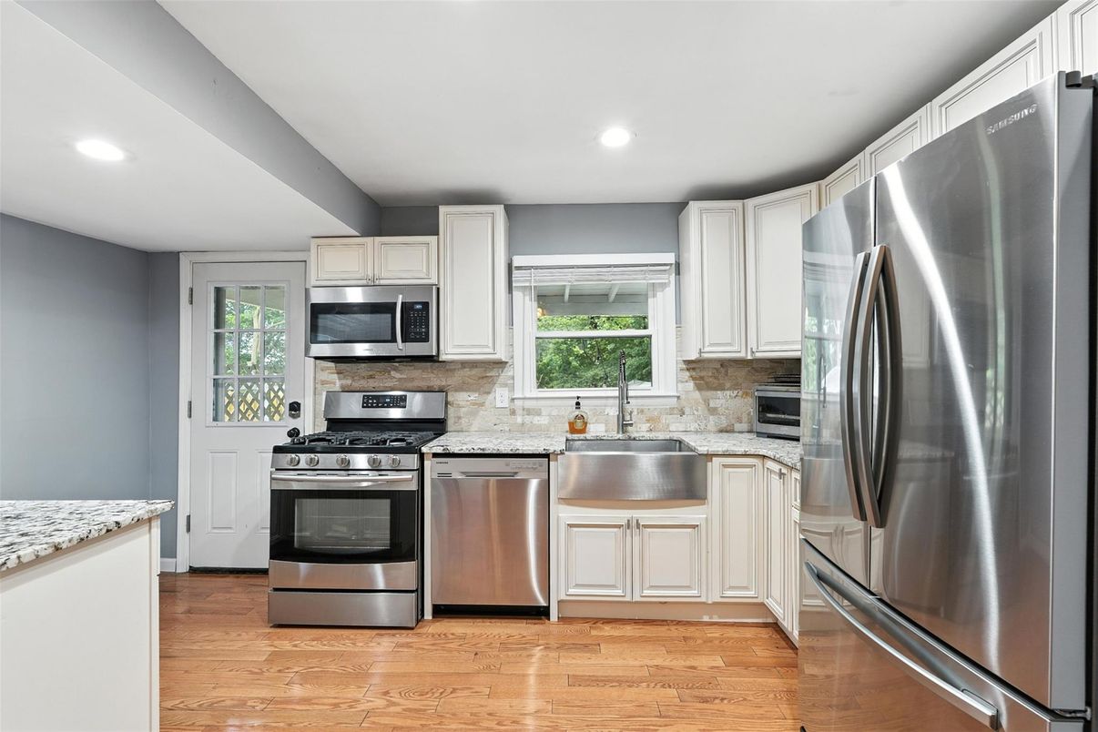 Interior, Kitchen, Recessed Lighting, Stainless Steel Appliances, Wood Texture Flooring