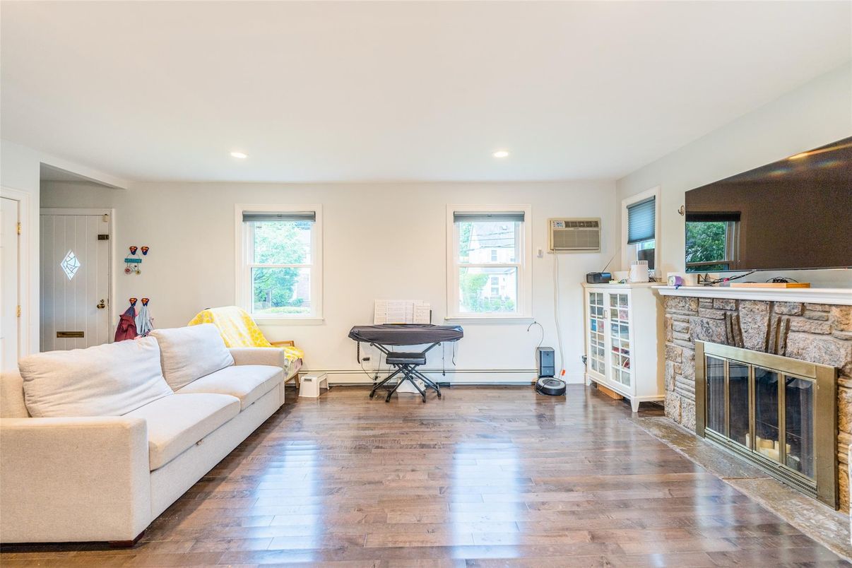 Fireplace, Interior, Living room, Recessed Lighting, Wood Texture Flooring