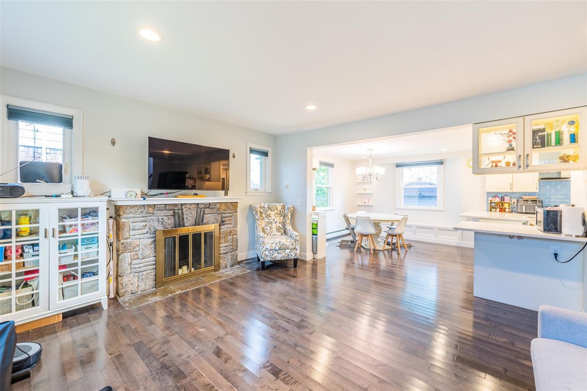 Chandelier, Dining room, Fireplace, Interior, Kitchen, Recessed Lighting, Wood Texture Flooring