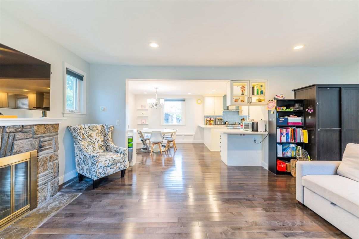Chandelier, Dining room, Fireplace, Interior, Kitchen, Pendant Lights, Recessed Lighting, Wood Texture Flooring