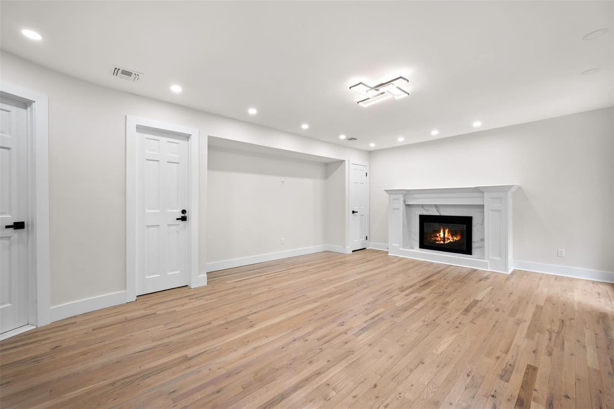 Empty room, Fireplace, Interior, Recessed Lighting, Wood Texture Flooring