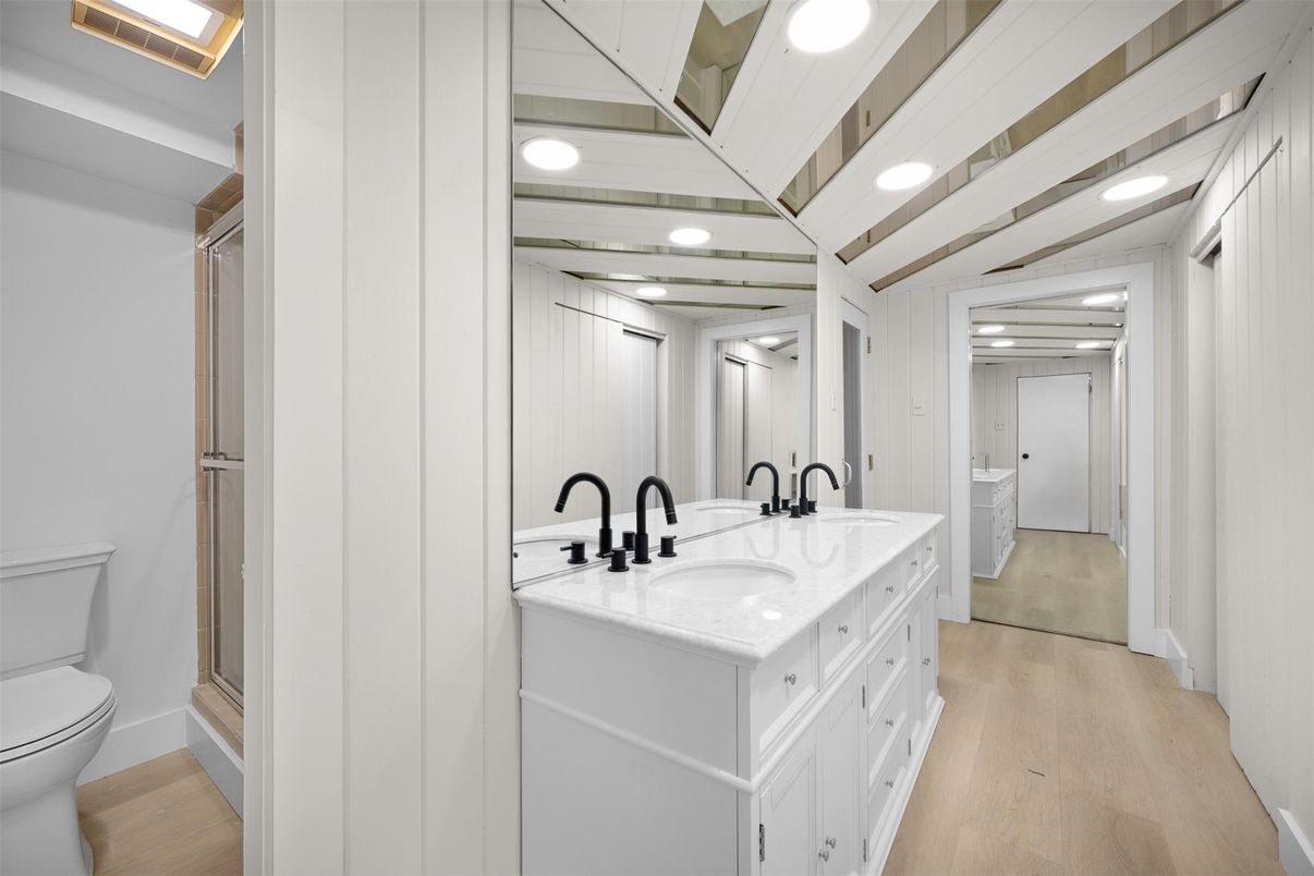 Bathroom, Dual Sink Vanities, Interior, Recessed Lighting, Wood Texture Flooring