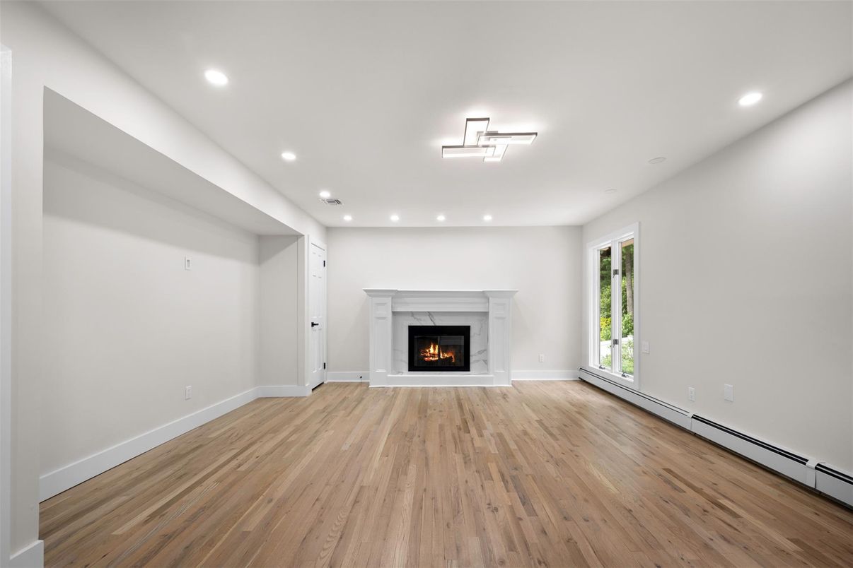 Empty room, Fireplace, Interior, Recessed Lighting, Wood Texture Flooring