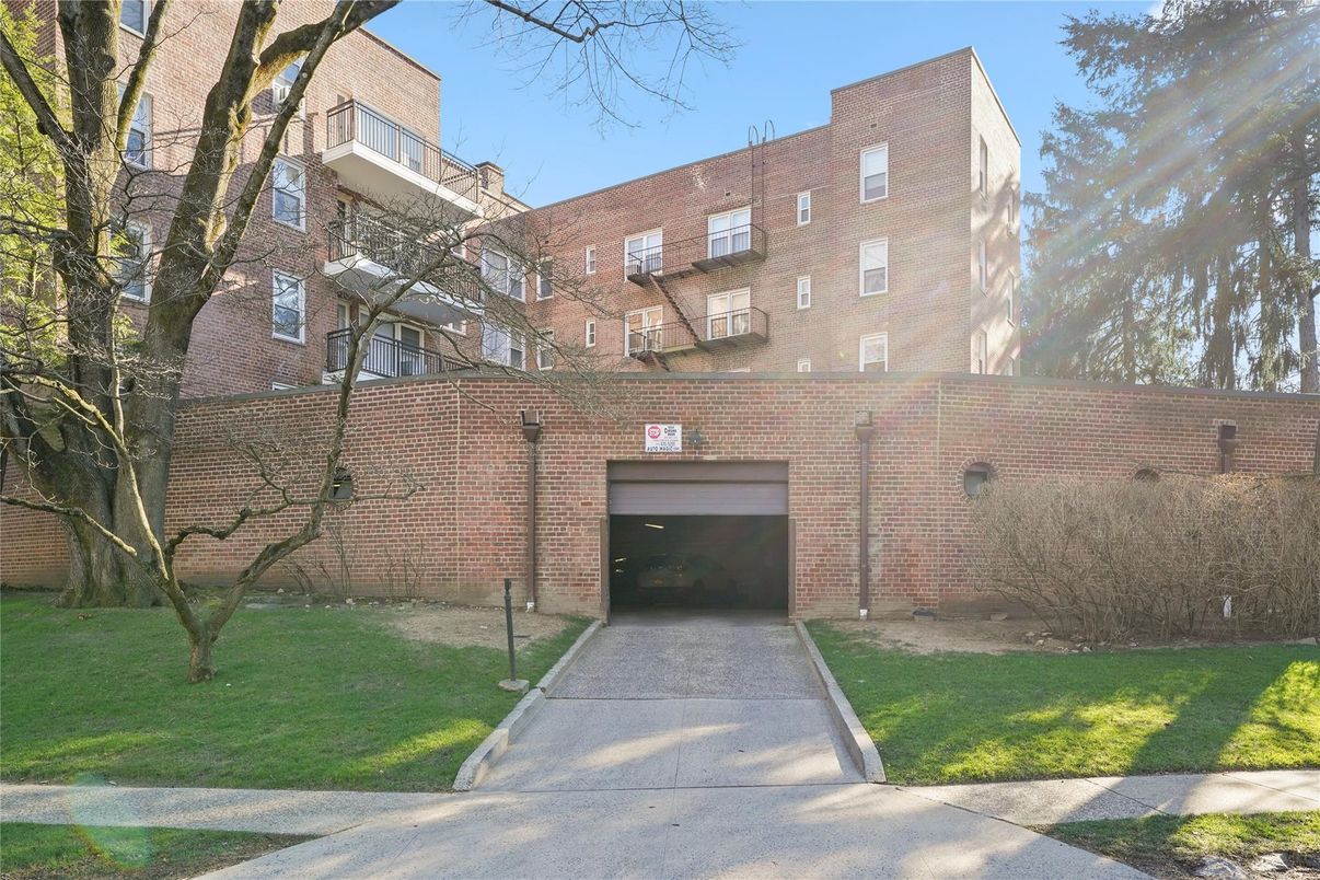 Exterior, Facade, Brick Facade, Condo Building