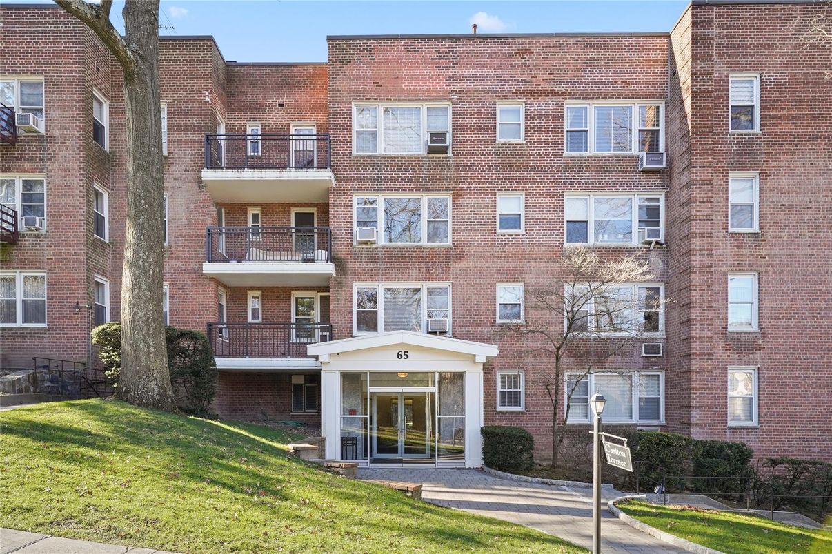 Exterior, Facade, Brick Facade, Condo Building