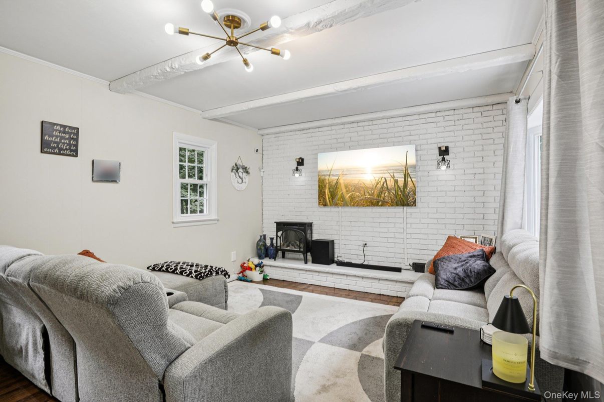 Fireplace, Interior, Living room, Pendant Lights, Stone Walls, Wood Texture Flooring