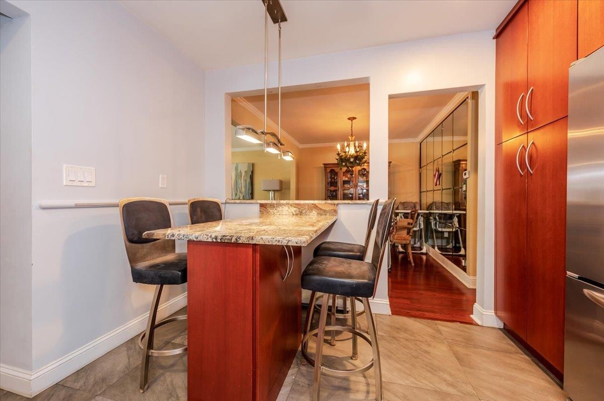Chandelier, Dining room, Interior, Kitchen, Pendant Lights, Stainless Steel Appliances, Wood Texture Flooring