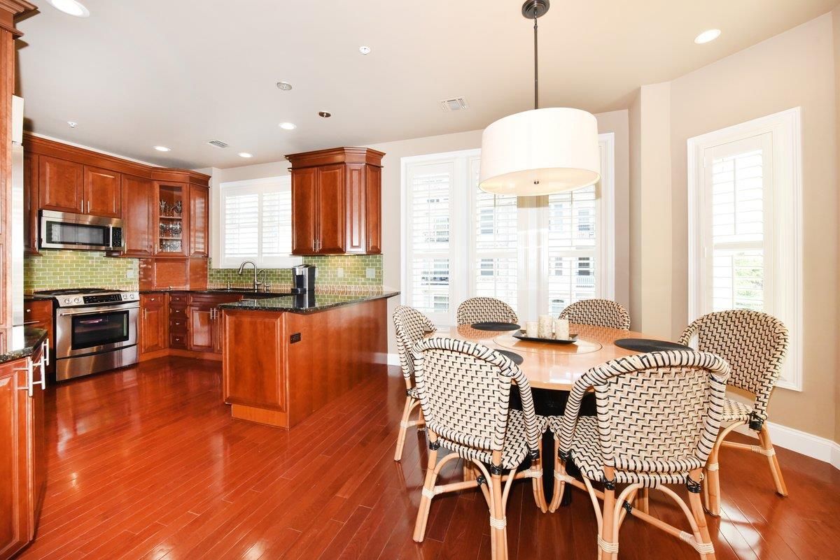 Dining room, Interior, Kitchen, Pendant Lights, Recessed Lighting, Stainless Steel Appliances, Wood Texture Flooring
