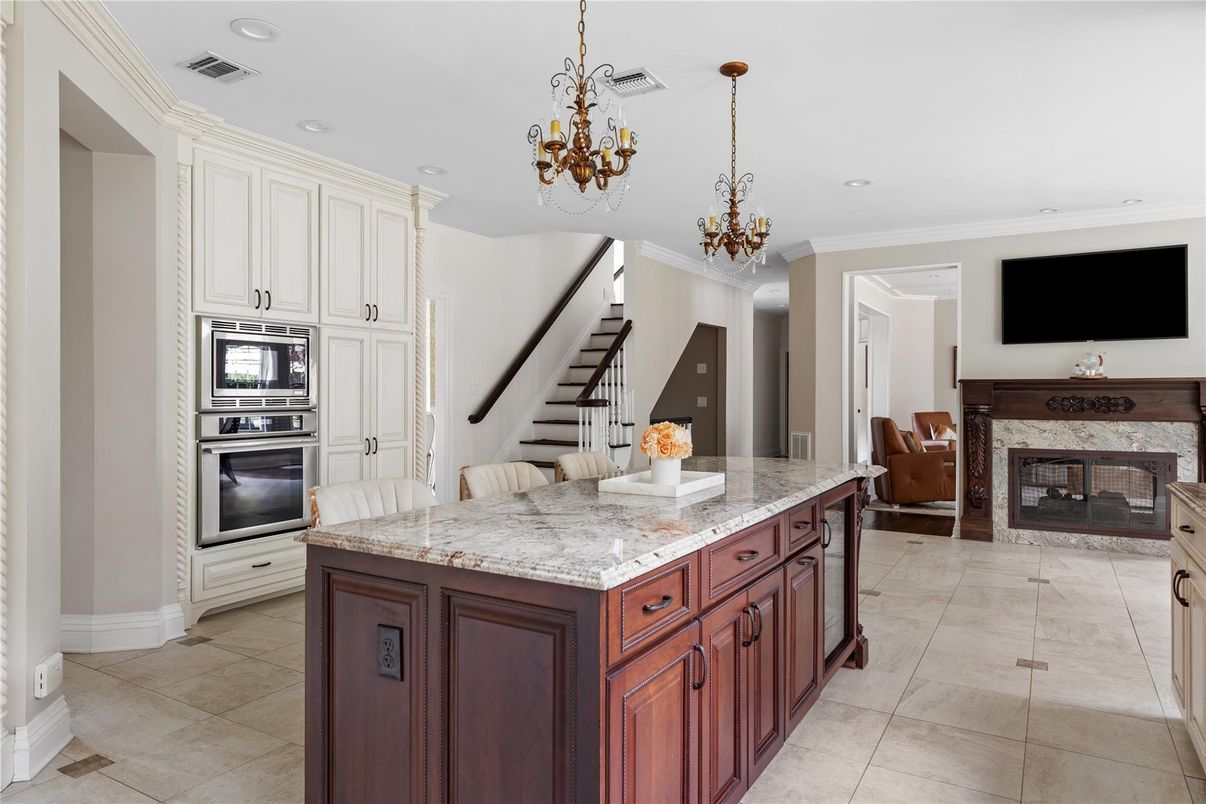 Chandelier, Fireplace, Interior, Kitchen, Recessed Lighting, Stainless Steel Appliances