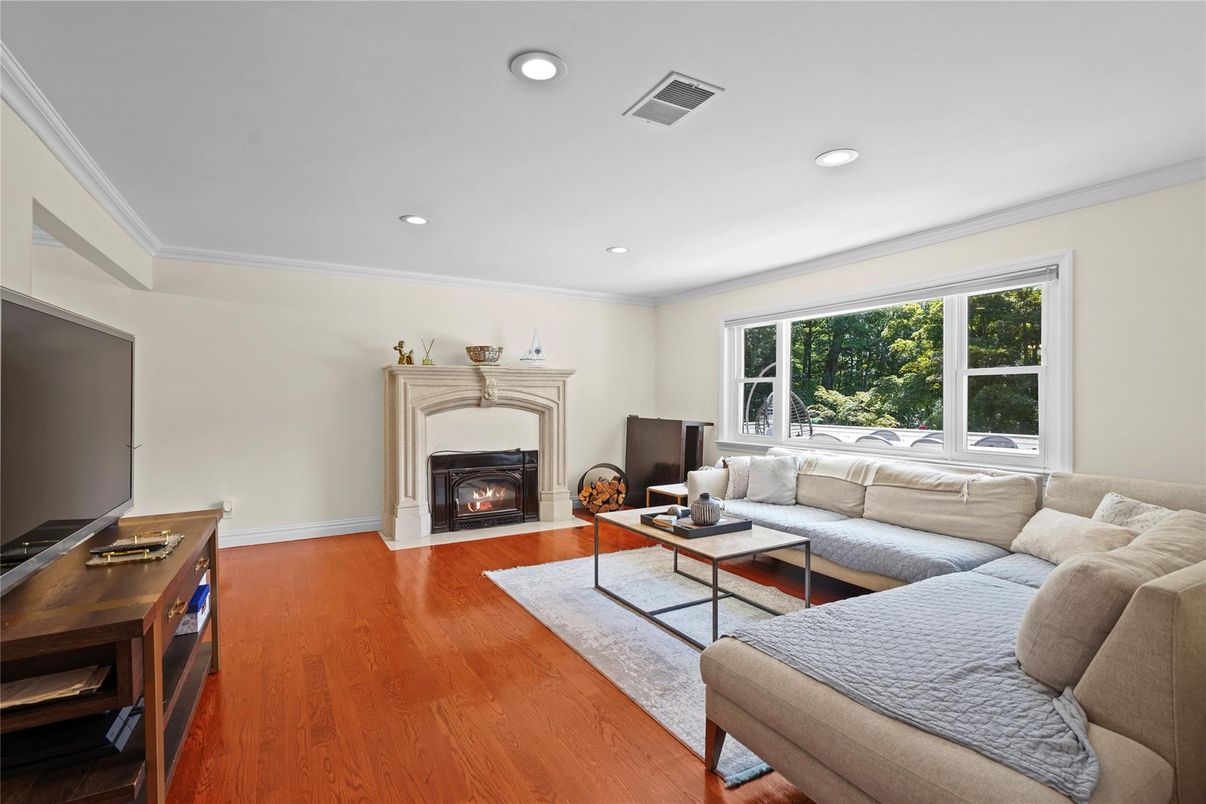 Fireplace, Interior, Living room, Recessed Lighting, Wood Texture Flooring