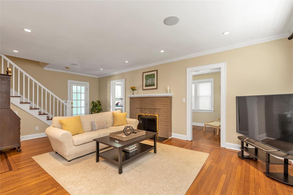 Fireplace, Interior, Living room, Recessed Lighting, Wood Texture Flooring