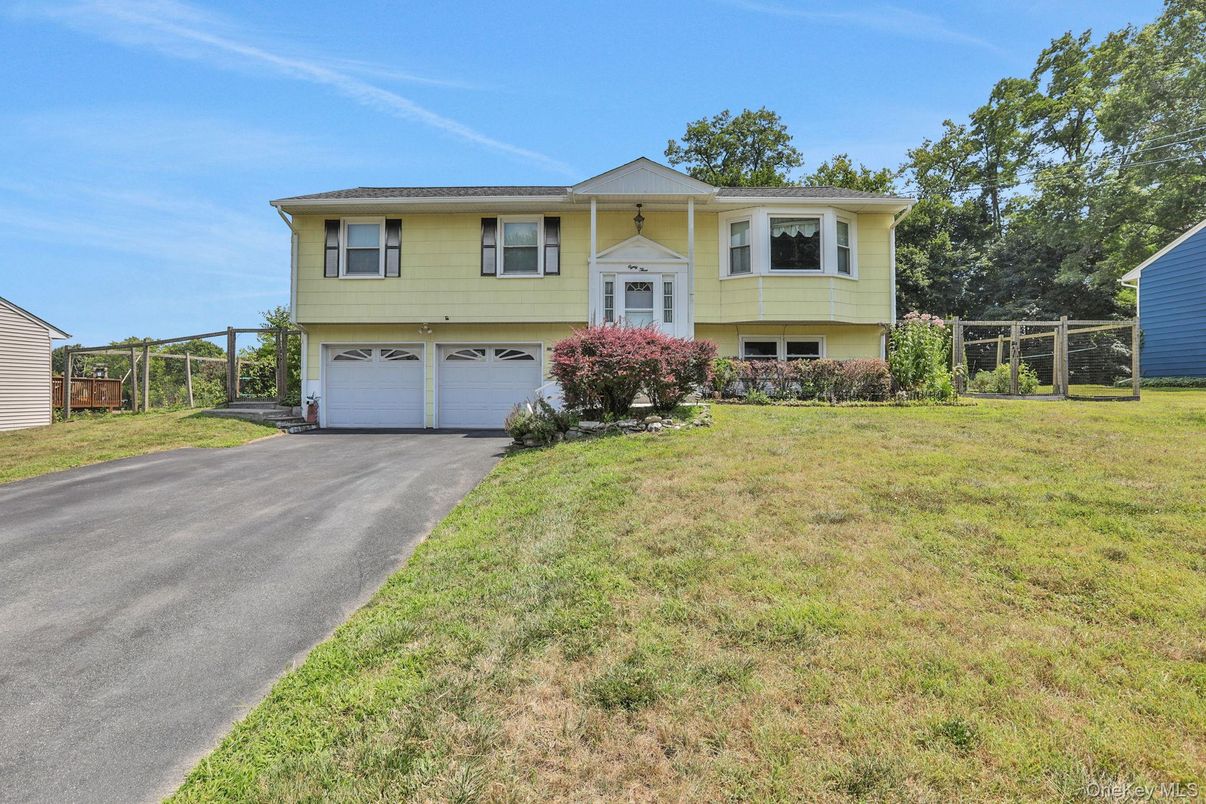 Attached, Exterior, Facade, Raised Ranch
