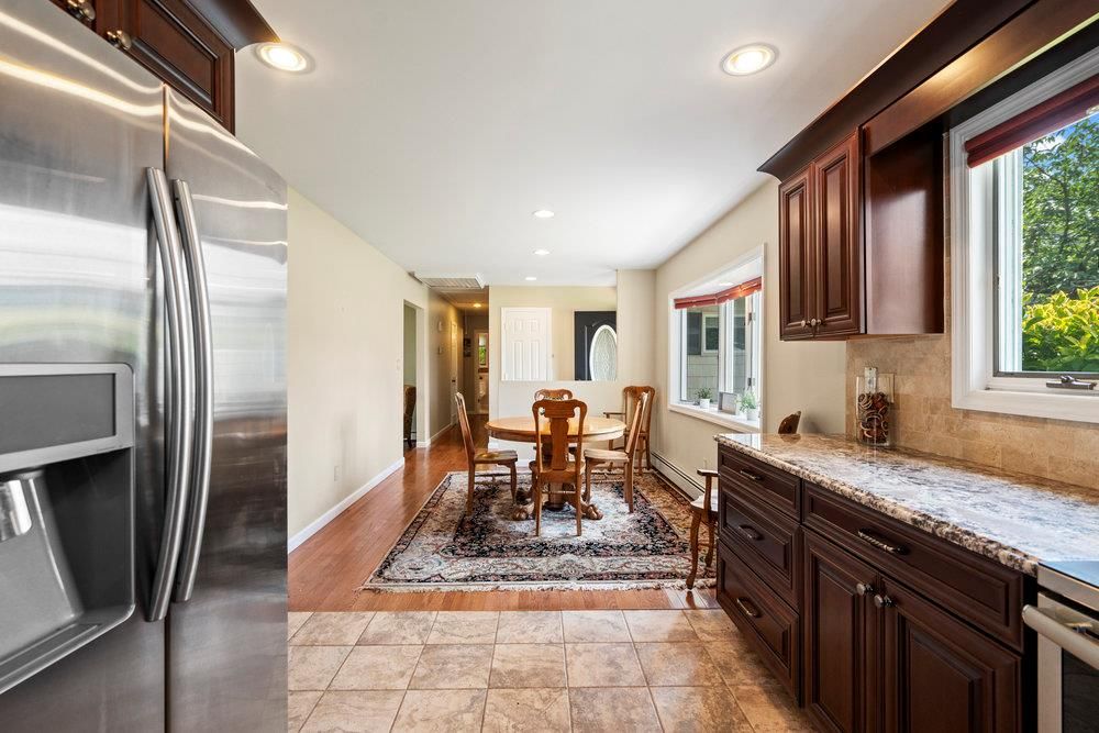 Dining room, Interior, Kitchen, Recessed Lighting, Stainless Steel Appliances, Wood Texture Flooring