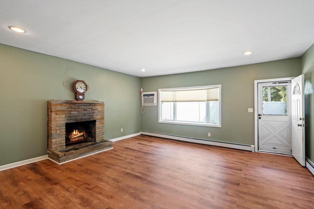 Empty room, Fireplace, Interior, Recessed Lighting, Wood Texture Flooring