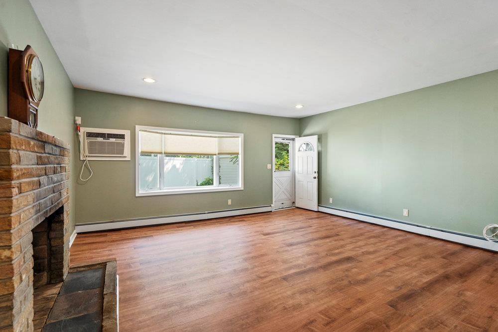 Empty room, Fireplace, Interior, Recessed Lighting, Wood Texture Flooring