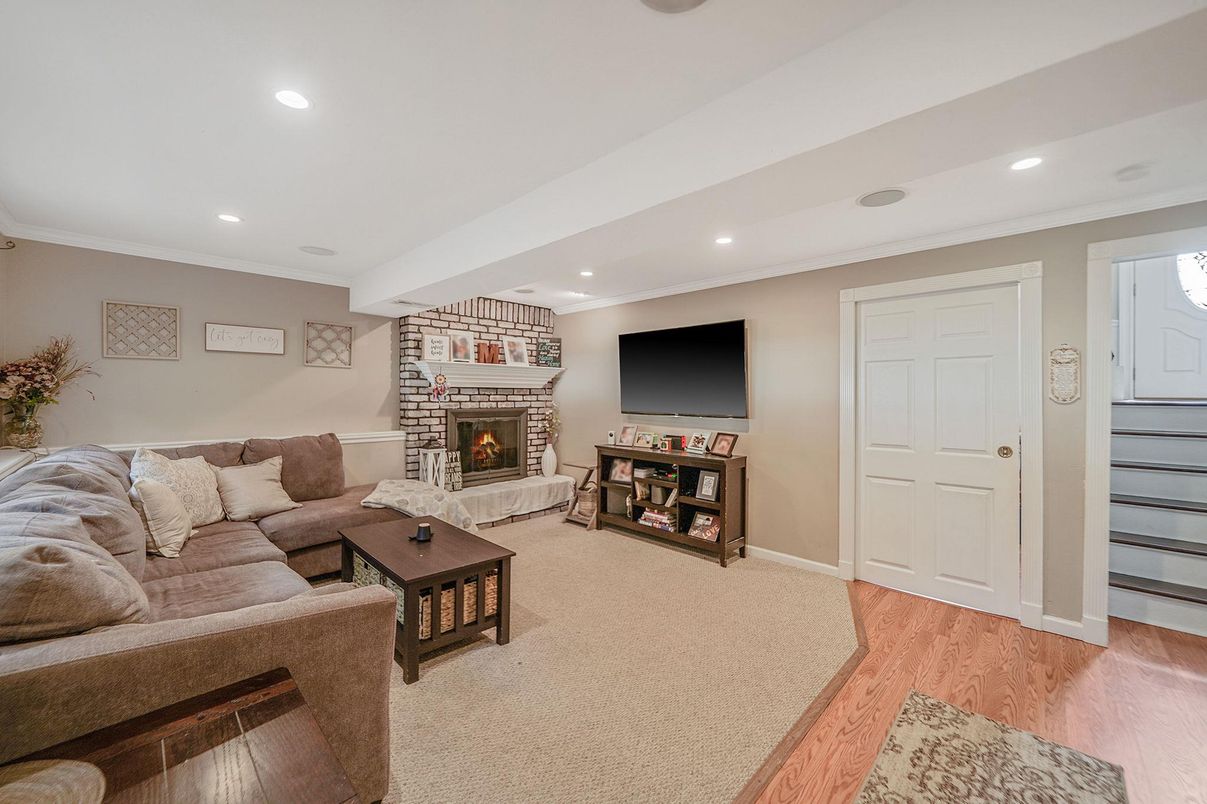 Fireplace, Interior, Living room, Recessed Lighting, Wood Texture Flooring