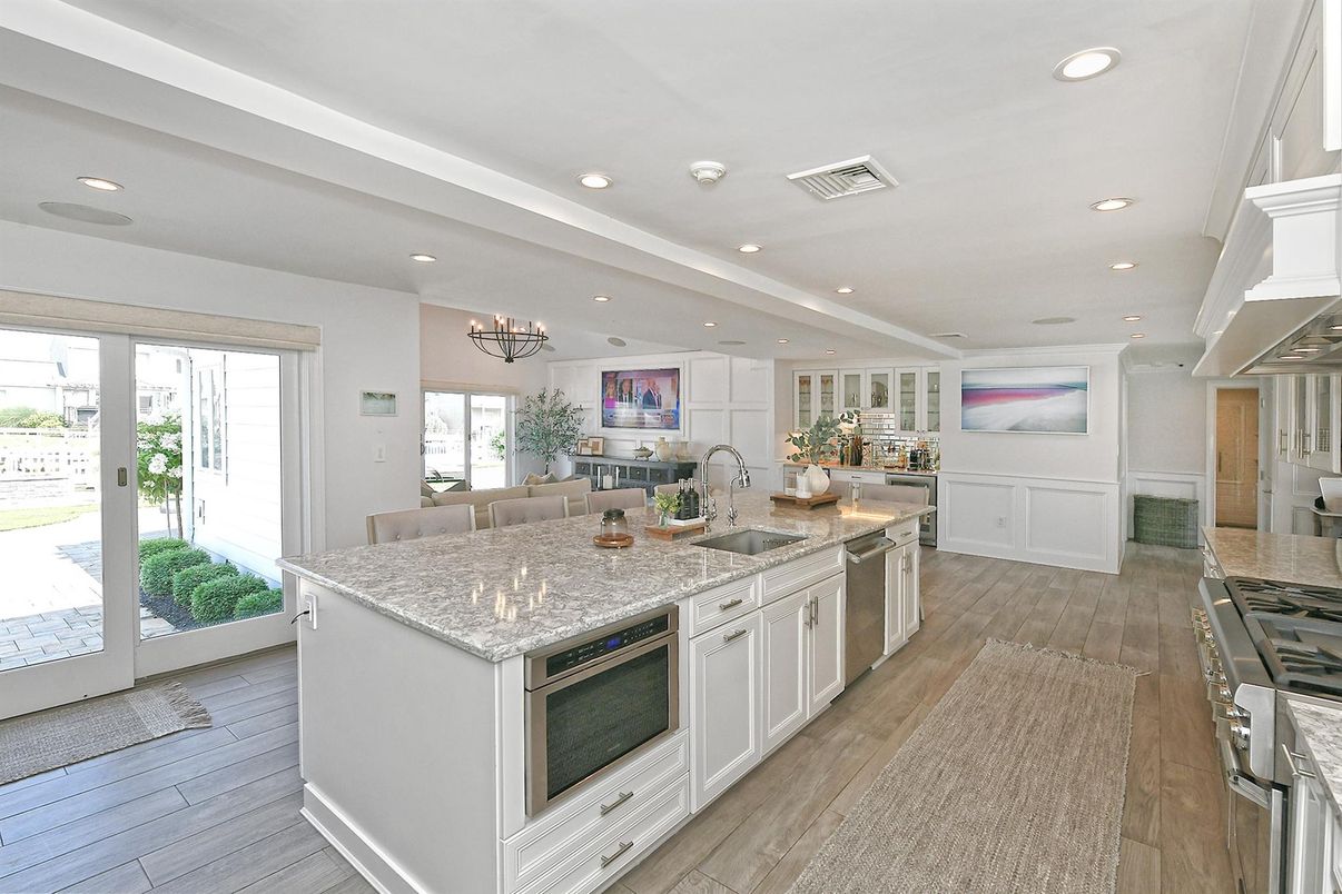 Chandelier, Interior, Kitchen, Recessed Lighting, Stainless Steel Appliances, Wood Texture Flooring