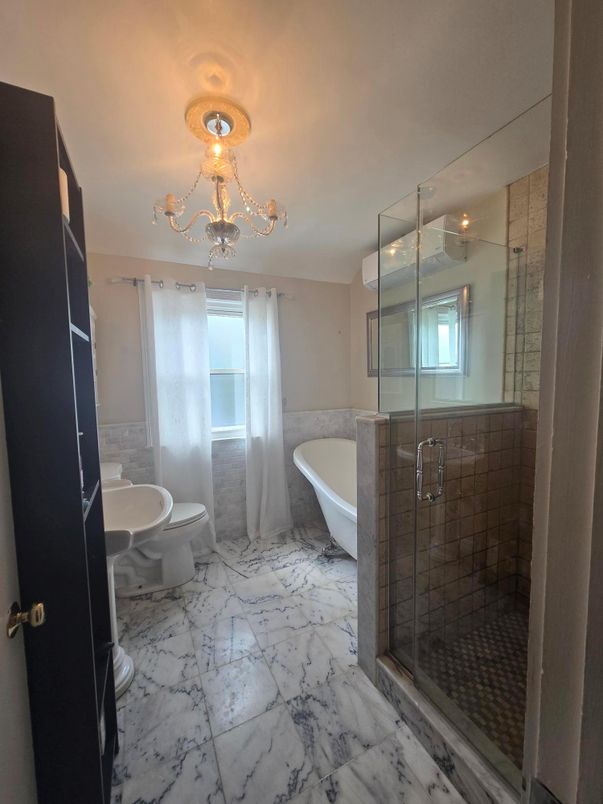 Bathroom, Chandelier, Free Standing Baths, Glass Shower, Interior, Marble