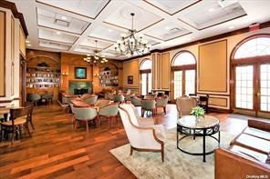 Chandelier, Dining room, Fireplace, Interior, Living room, Pendant Lights, Recessed Lighting, Wood Texture Flooring, Wooden Walls
