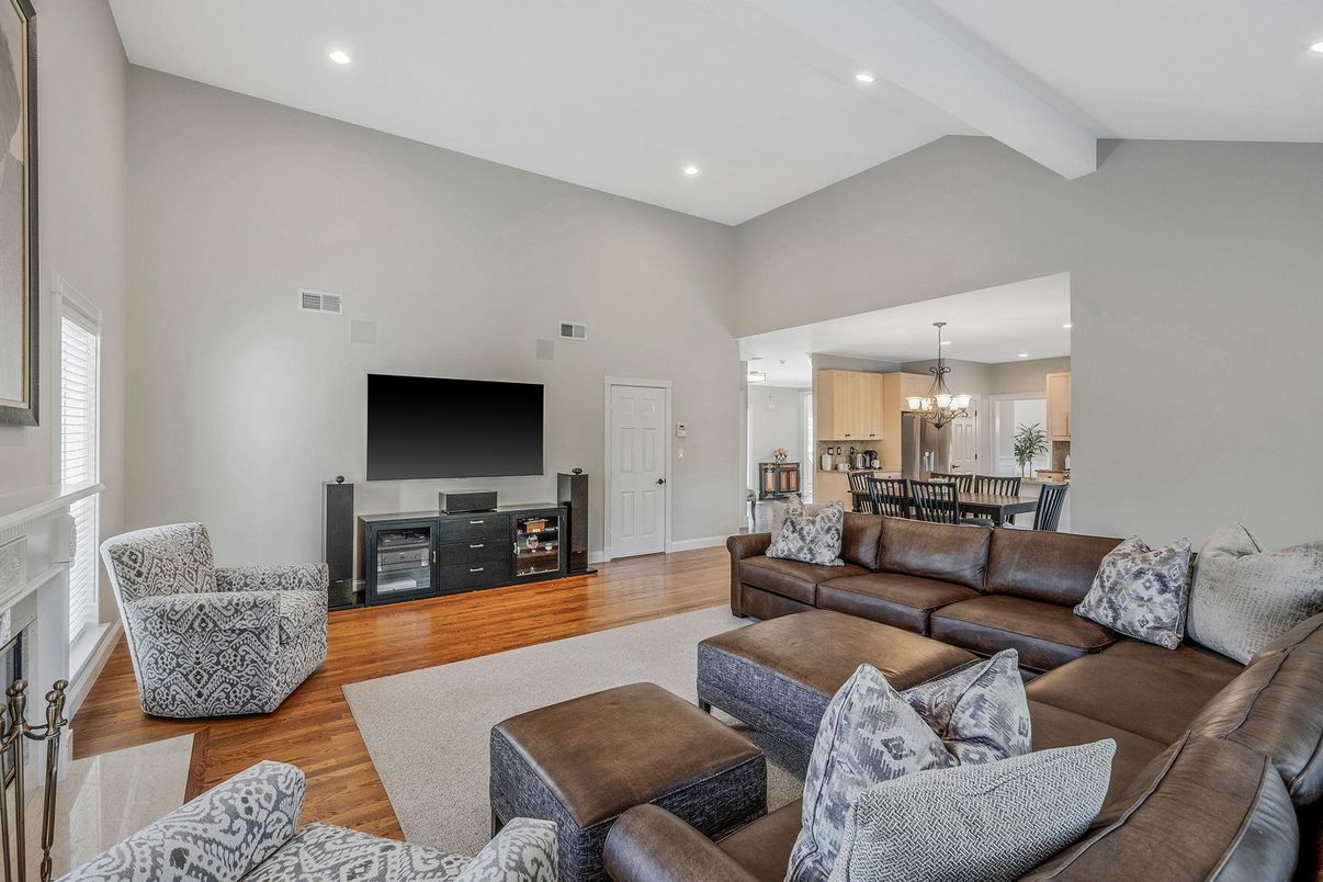 Chandelier, Dining room, Fireplace, Interior, Living room, Recessed Lighting, Wood Texture Flooring