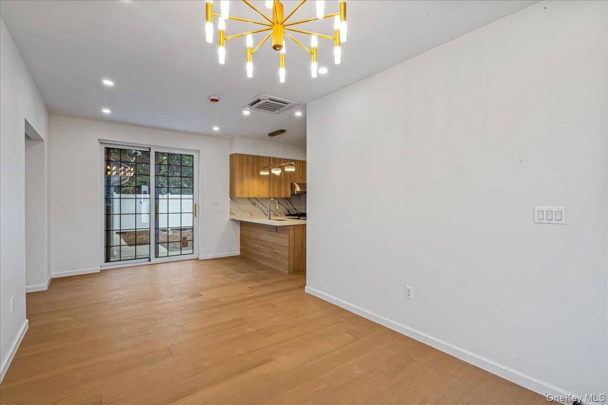 Empty room, Interior, Kitchen, Pendant Lights, Recessed Lighting, Wood Texture Flooring