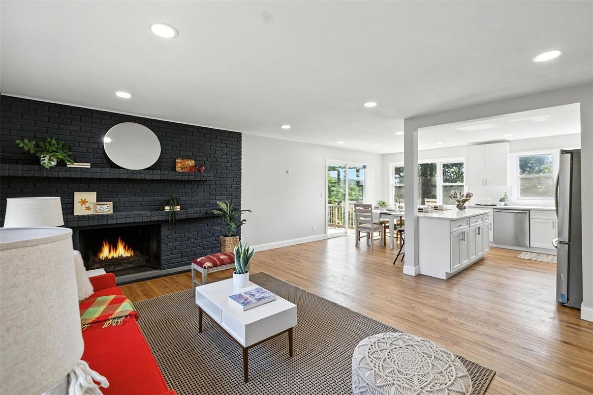 Dining room, Fireplace, Interior, Kitchen, Living room, Recessed Lighting, Stone Walls, Wood Texture Flooring