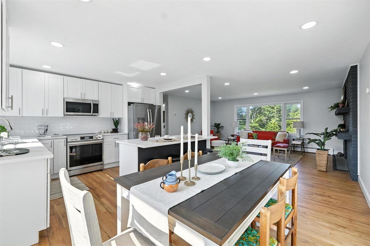 Dining room, Interior, Kitchen, Living room, Recessed Lighting, Stainless Steel Appliances, Wood Texture Flooring
