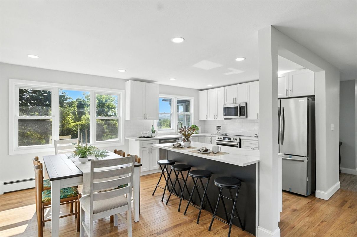 Dining room, Interior, Kitchen, Recessed Lighting, Stainless Steel Appliances, Wood Texture Flooring