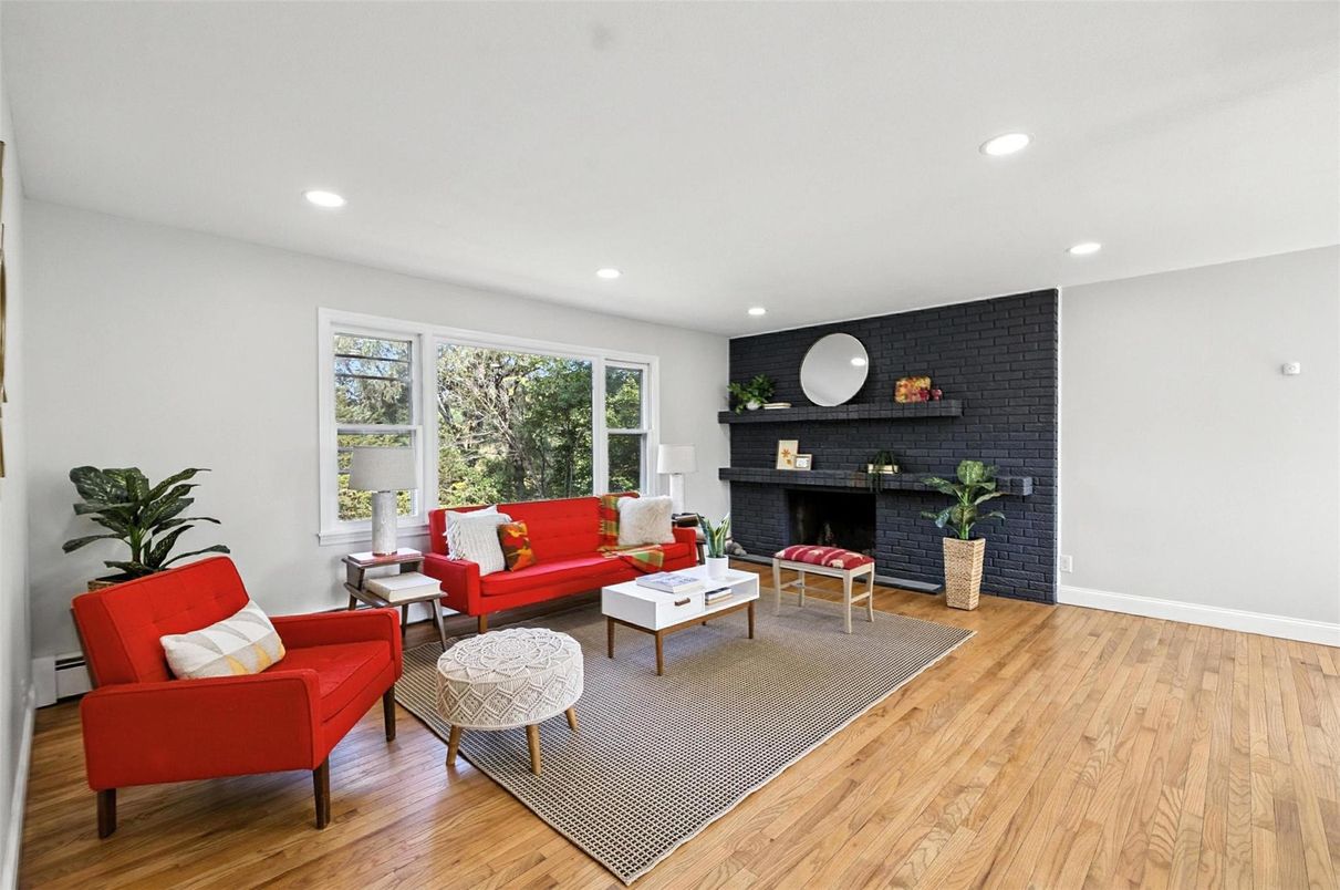 Fireplace, Interior, Living room, Recessed Lighting, Stone Walls, Wood Texture Flooring