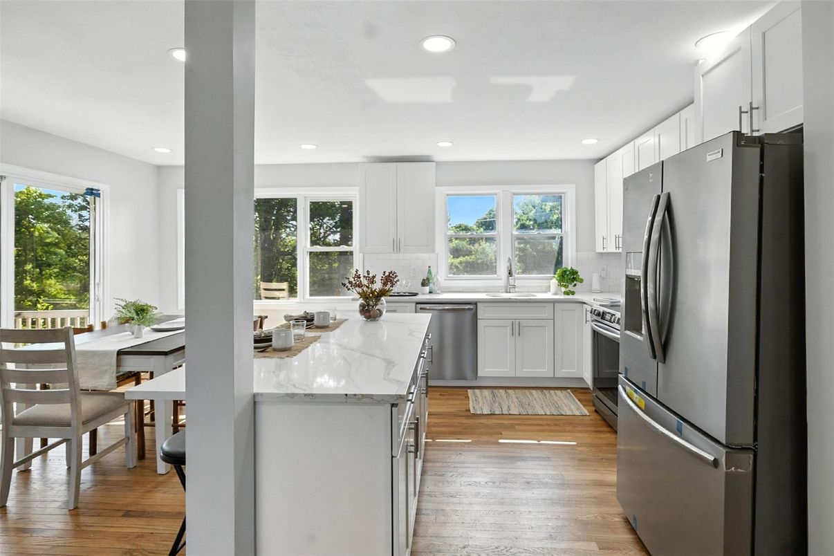 Dining room, Interior, Kitchen, Recessed Lighting, Stainless Steel Appliances, Wood Texture Flooring