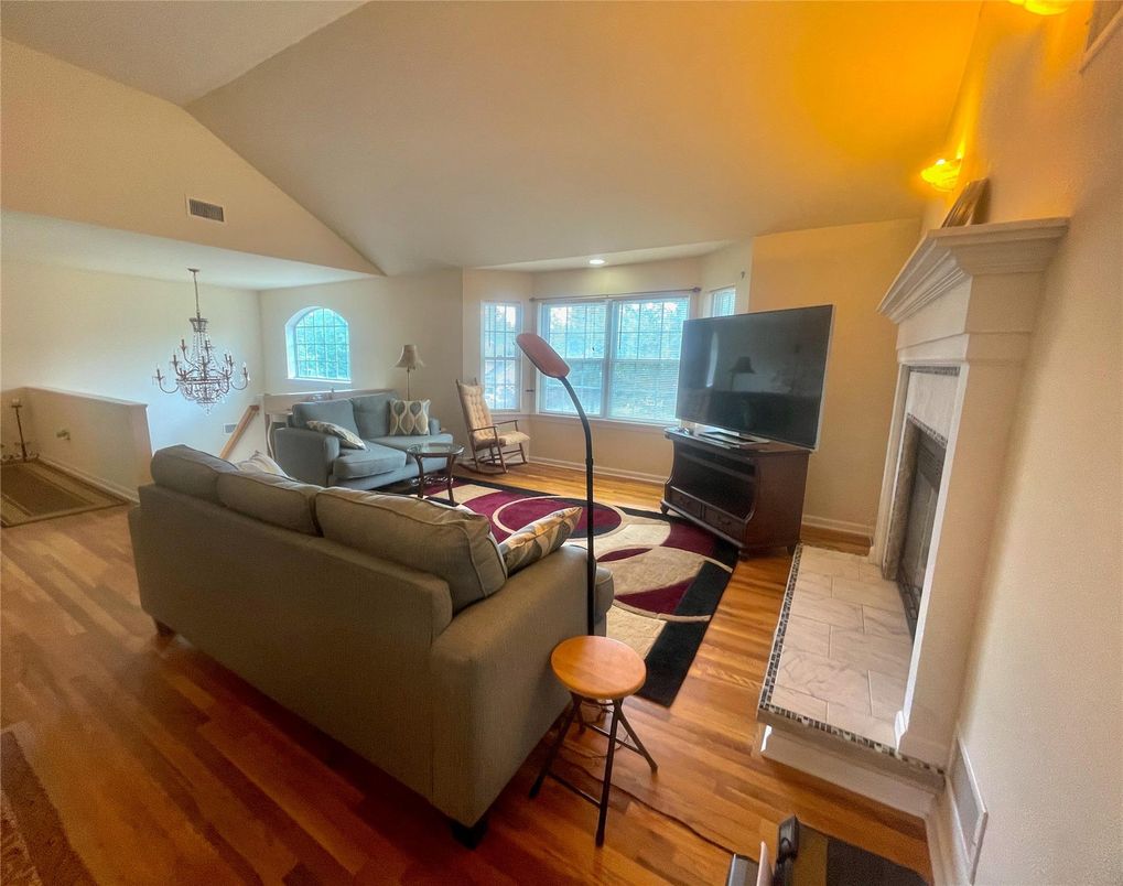 Chandelier, Dining room, Fireplace, Interior, Living room, Wood Texture Flooring