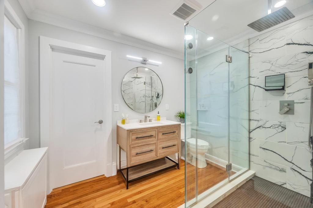 Bathroom, Glass Shower, Interior, Marble Walls, Recessed Lighting, Wood Texture Flooring
