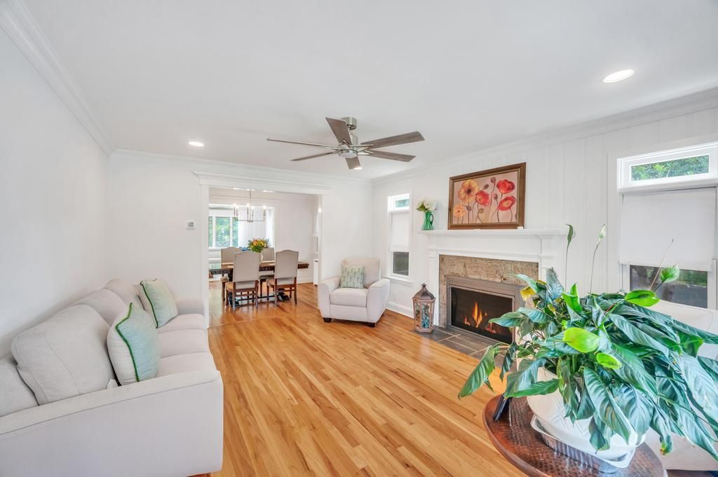 Dining room, Fireplace, Interior, Living room, Pendant Lights, Recessed Lighting, Wood Texture Flooring
