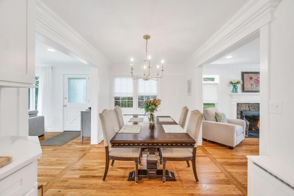 Chandelier, Dining room, Fireplace, Interior, Recessed Lighting, Wood Texture Flooring