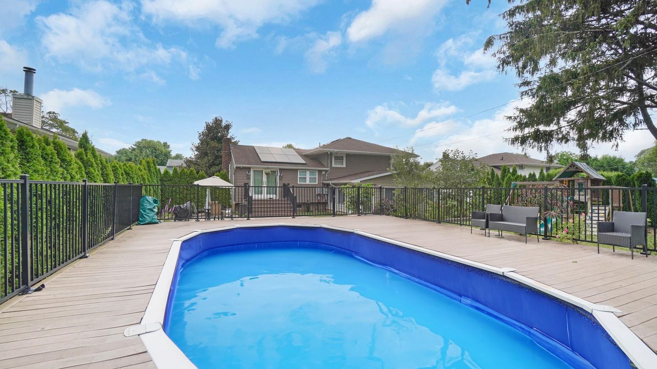 Exterior, Pool, Solar Panels