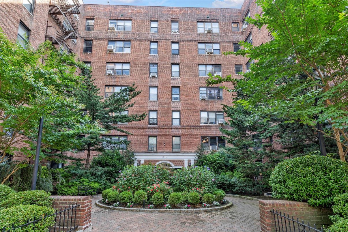 Exterior, Facade, Brick Facade, Condo Building