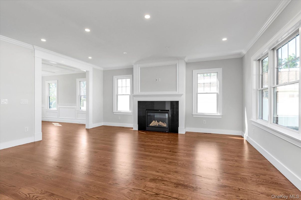 Empty room, Fireplace, Interior, Recessed Lighting, Wood Texture Flooring