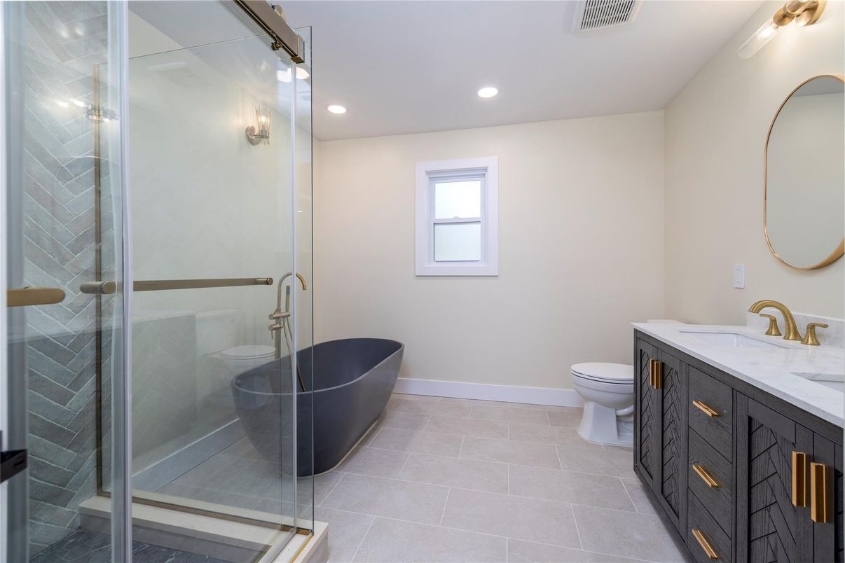 Bathroom, Dual Sink Vanities, Free Standing Baths, Glass Shower, Interior, Recessed Lighting