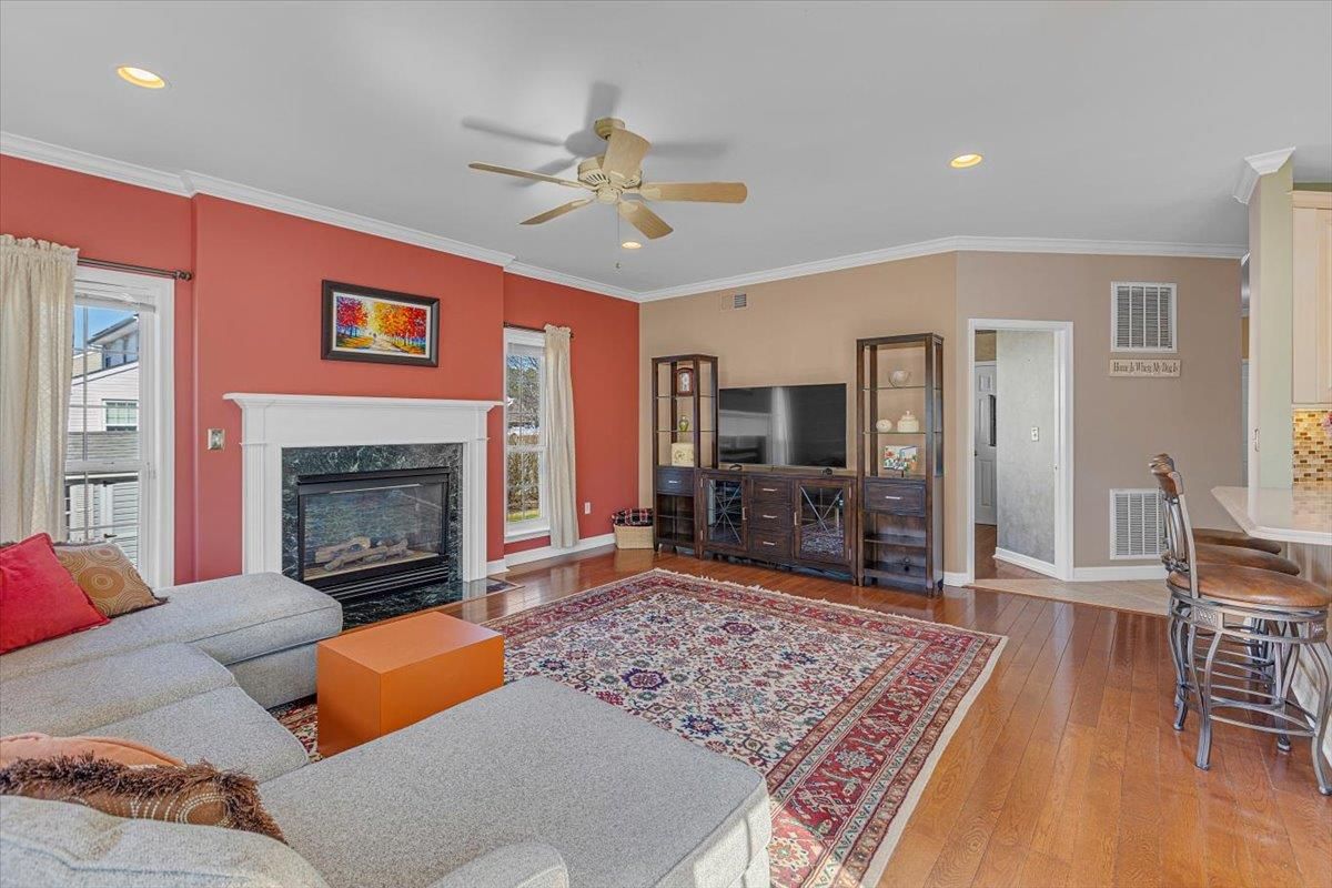 Dining room, Fireplace, Interior, Living room, Recessed Lighting, Wood Texture Flooring