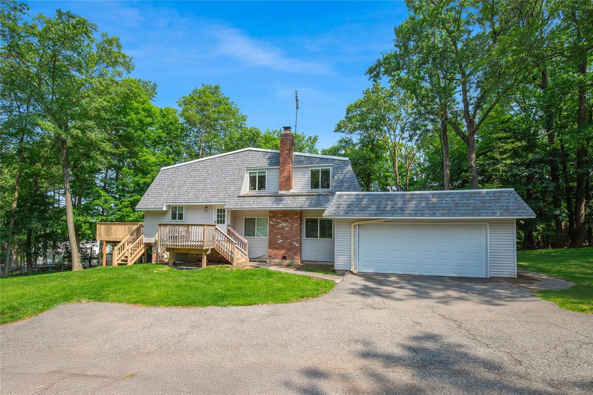 Attached, Backyard, Exterior, Facade, Brick Facade, Cape Cod