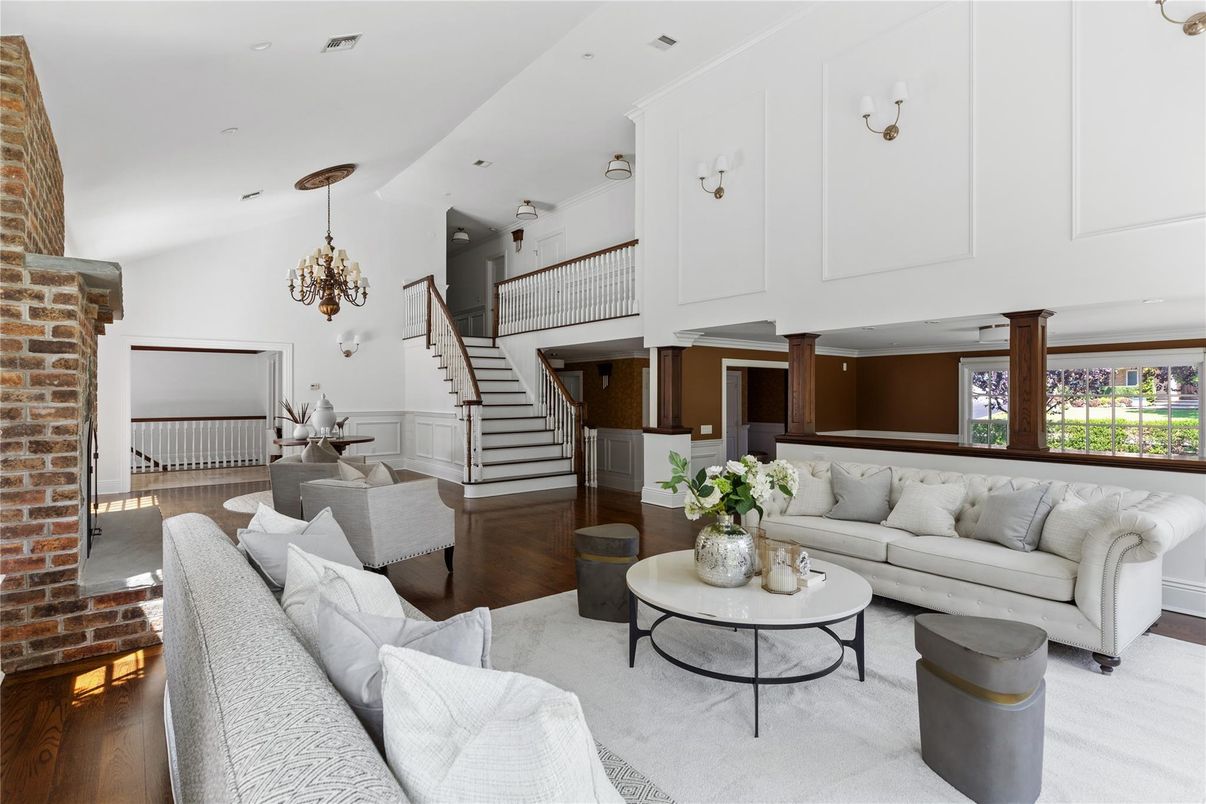 Chandelier, Interior, Living room, Pendant Lights, Recessed Lighting, Stone Walls, Wood Texture Flooring