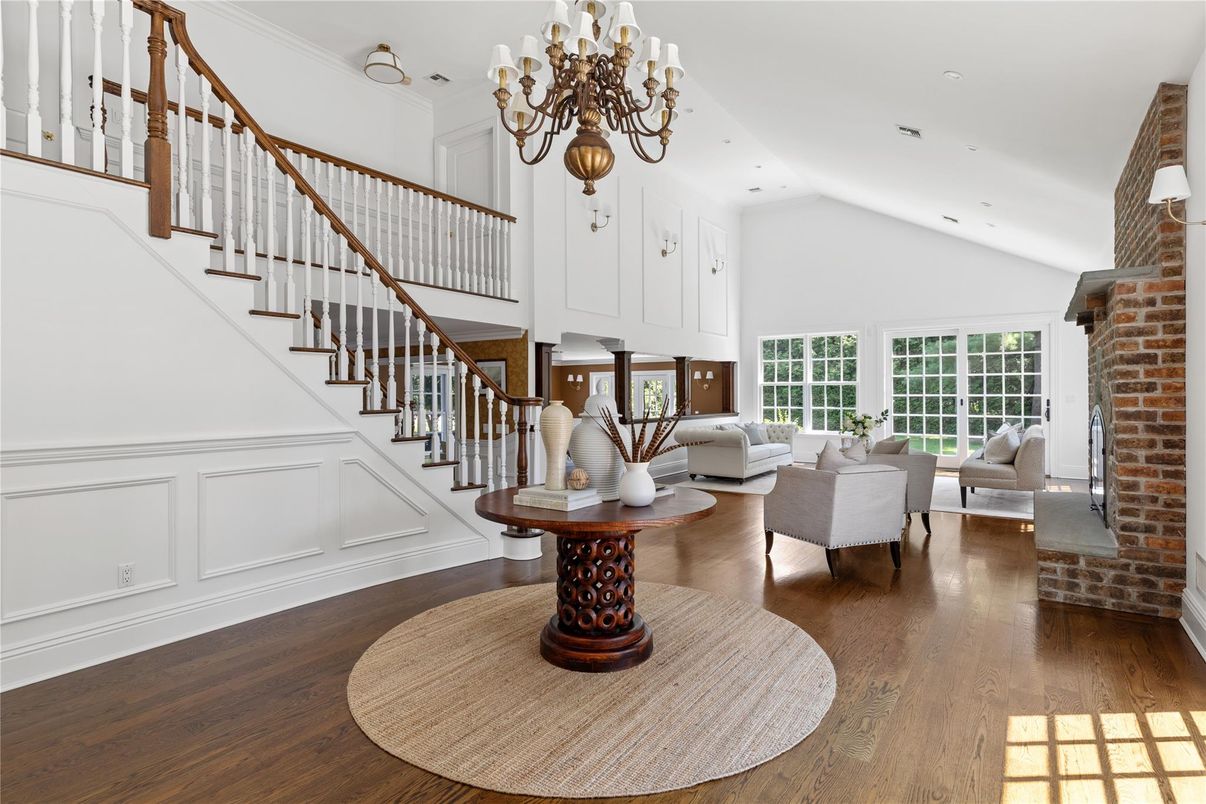 Chandelier, Interior, Living room, Recessed Lighting, Stone Walls, Wood Texture Flooring