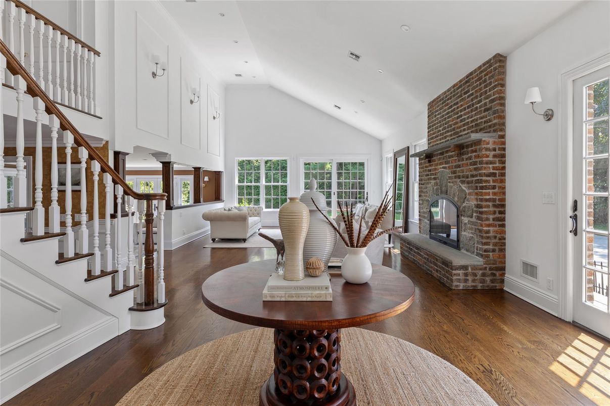 Fireplace, Interior, Living room, Recessed Lighting, Stone Walls, Wood Texture Flooring
