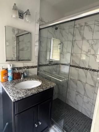 Bathroom, Dual Sink Vanities, Glass Shower, Interior, Marble Walls