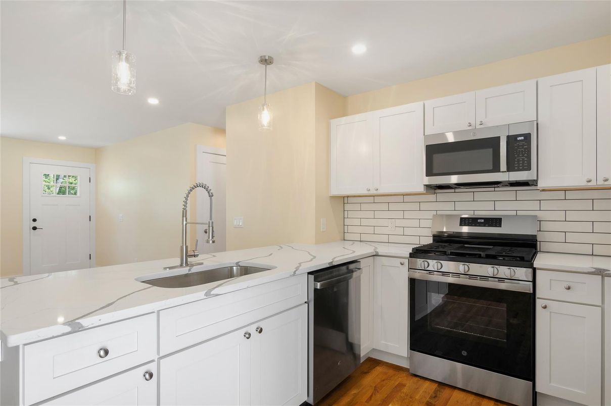 Interior, Kitchen, Pendant Lights, Recessed Lighting, Stainless Steel Appliances, Wood Texture Flooring